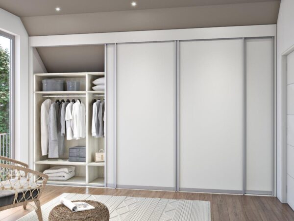 Built-in wardrobe with sliding doors in an attic, where every corner is optimally utilized.