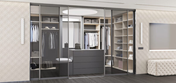 Wardrobe interior with transparent glass sliding doors, designed according to your wishes and needs.